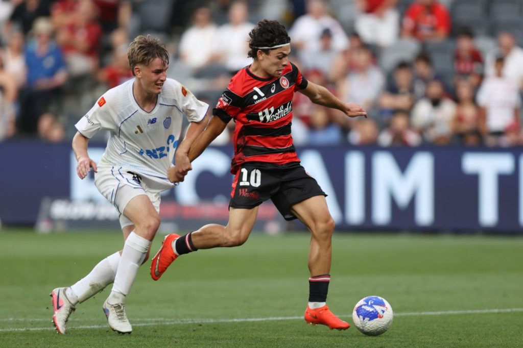 Miguel Di Pizio of the Wanderers is challenged by Luka Vicelich of Auckland FC at CommBank Stadium.
